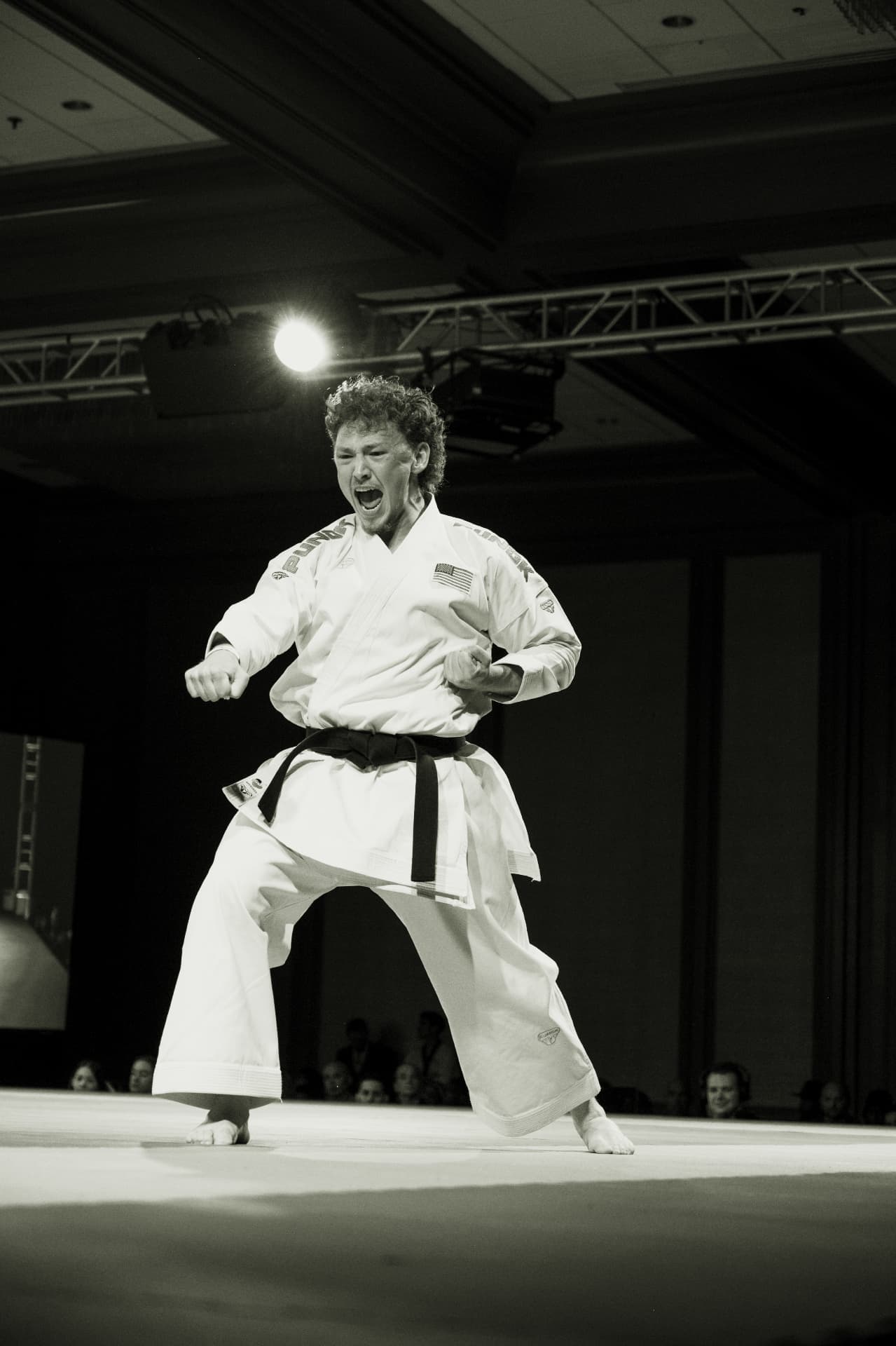 Karate athlete performing kata in competition
